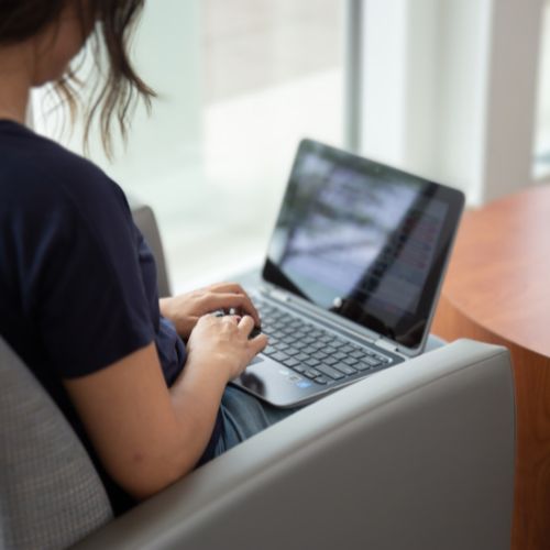 student working on their computer